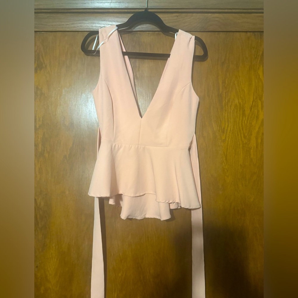 Adorbs! ! Pink sold out online! Simply Joyous Baby Pink Peplum Top w/Bow Accent